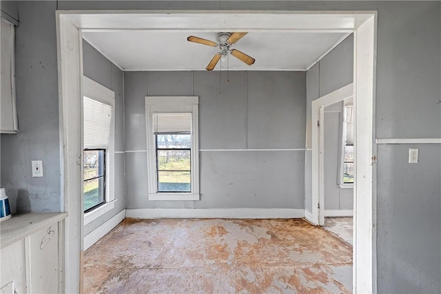 interior space featuring ceiling fan