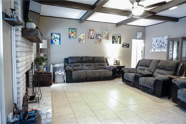 tiled living room featuring ceiling fan, a fireplace, and beamed ceiling