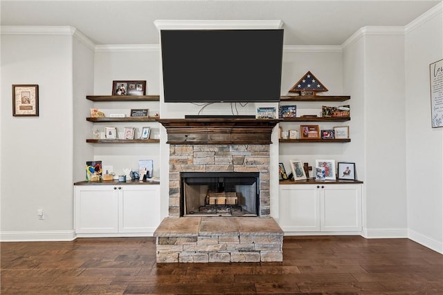 living room featuring a fireplace, dark wood-type flooring, and crown molding