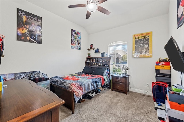 carpeted bedroom featuring ceiling fan and lofted ceiling