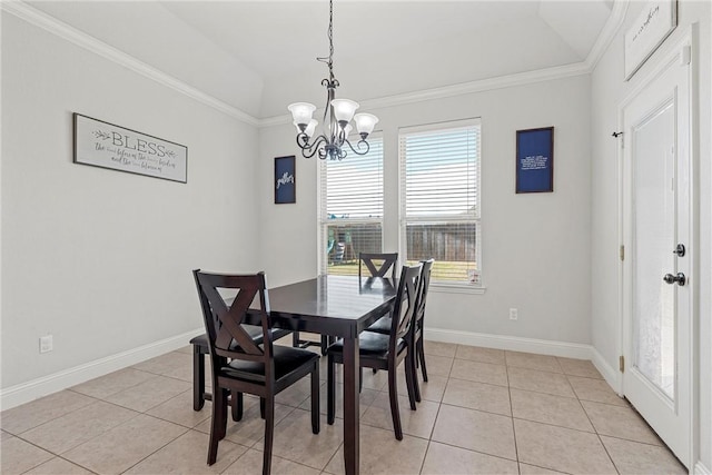 tiled dining room with a notable chandelier, ornamental molding, and vaulted ceiling