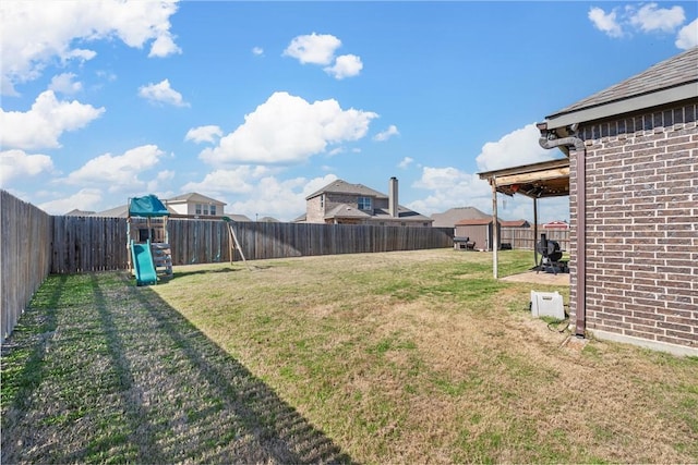 view of yard featuring a playground