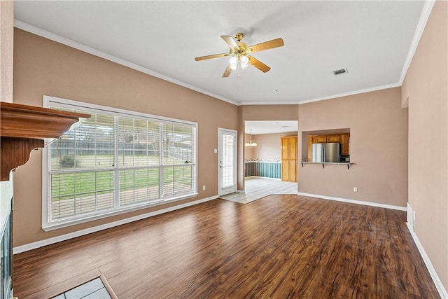 unfurnished living room with crown molding, ceiling fan, and wood-type flooring