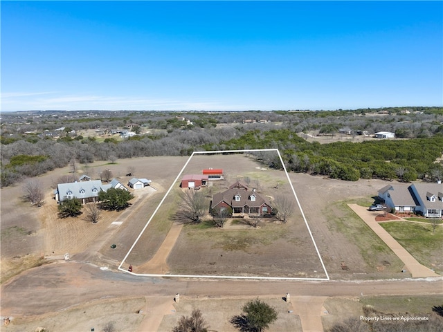 birds eye view of property featuring a rural view