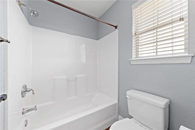 full bathroom featuring  shower combination and toilet