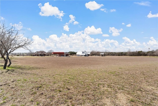 view of yard featuring a rural view