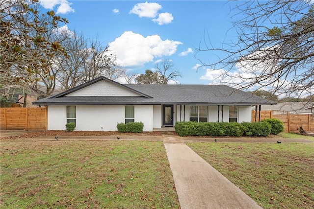 ranch-style home with a front yard