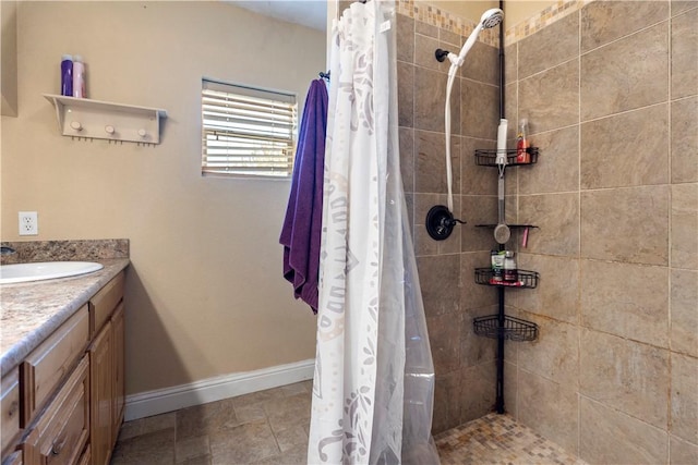 bathroom with vanity and walk in shower