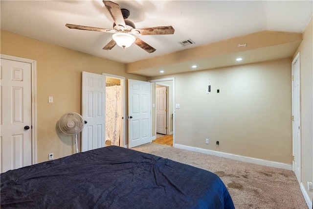 unfurnished bedroom featuring ceiling fan and light colored carpet