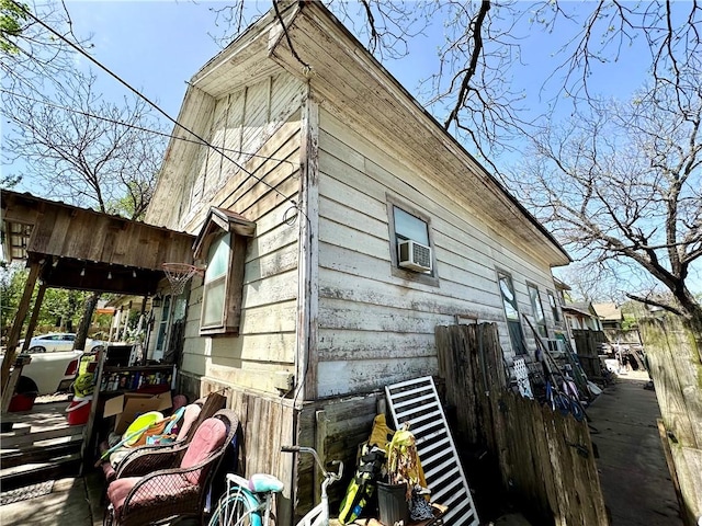 view of property exterior with cooling unit