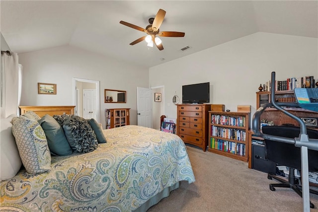 bedroom featuring light colored carpet, vaulted ceiling, and ceiling fan