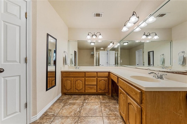 bathroom featuring tile patterned floors and vanity