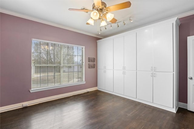 unfurnished bedroom with a closet, ceiling fan, dark hardwood / wood-style flooring, and ornamental molding