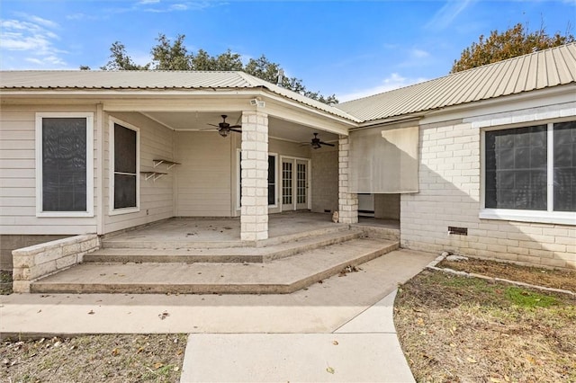 property entrance featuring ceiling fan and french doors