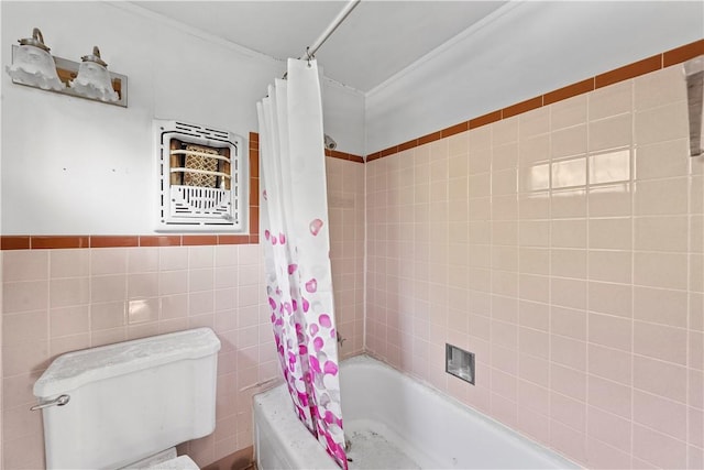 bathroom featuring tile walls and shower / tub combo with curtain