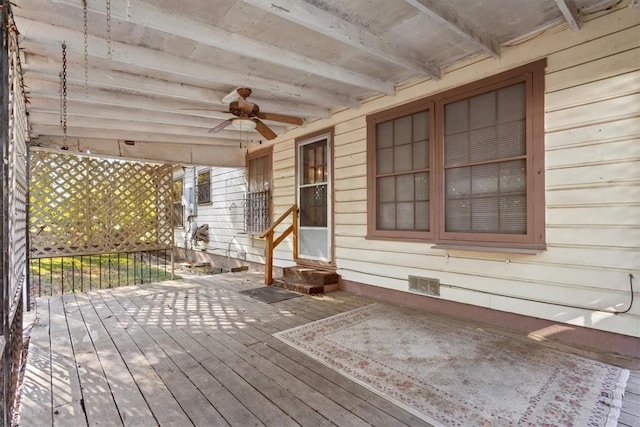 wooden terrace with ceiling fan