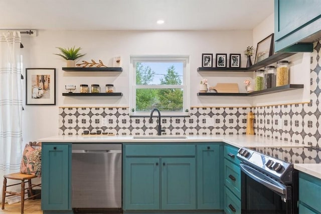 kitchen featuring blue cabinets, sink, stainless steel dishwasher, decorative backsplash, and electric range