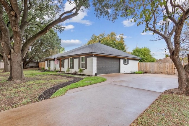 view of side of property with a garage