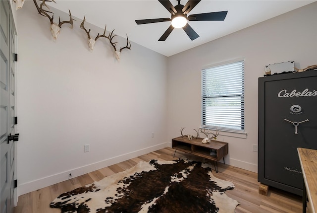 miscellaneous room featuring ceiling fan and light wood-type flooring