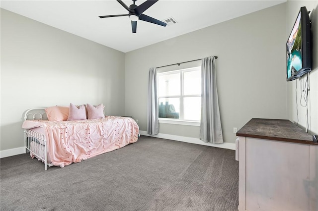 bedroom featuring ceiling fan and dark colored carpet