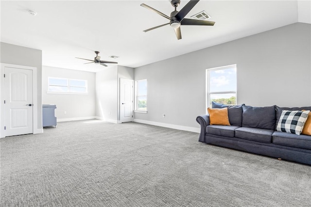 living room with ceiling fan and carpet floors