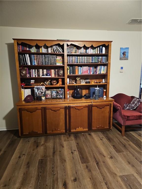 living area featuring dark wood-type flooring