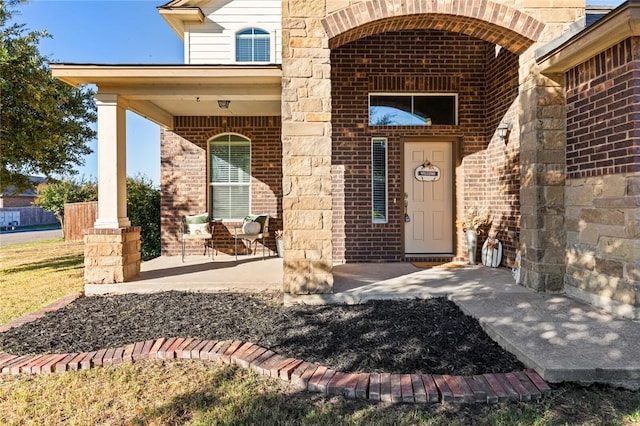 entrance to property with a porch