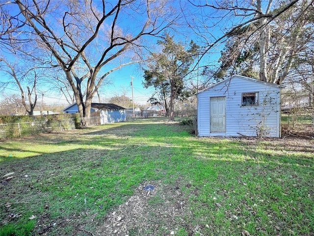 view of yard featuring a storage unit