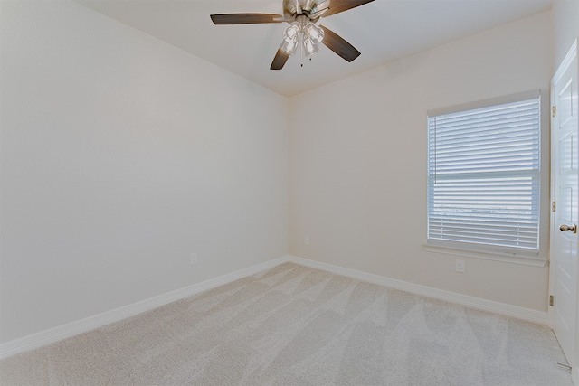 unfurnished room with light carpet and ceiling fan