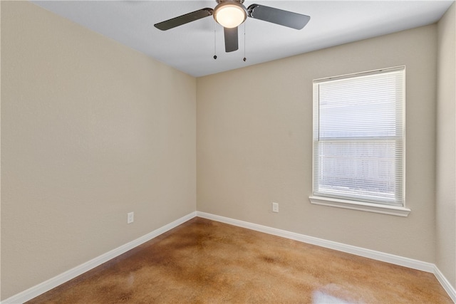 unfurnished room with baseboards and a ceiling fan