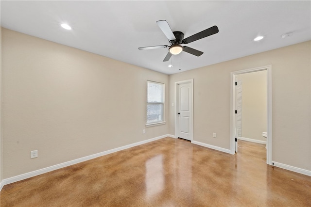 spare room featuring baseboards, a ceiling fan, and recessed lighting