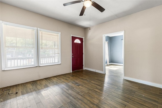 foyer featuring ceiling fan and dark hardwood / wood-style flooring