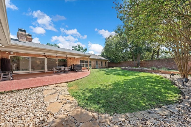 view of yard with a patio area