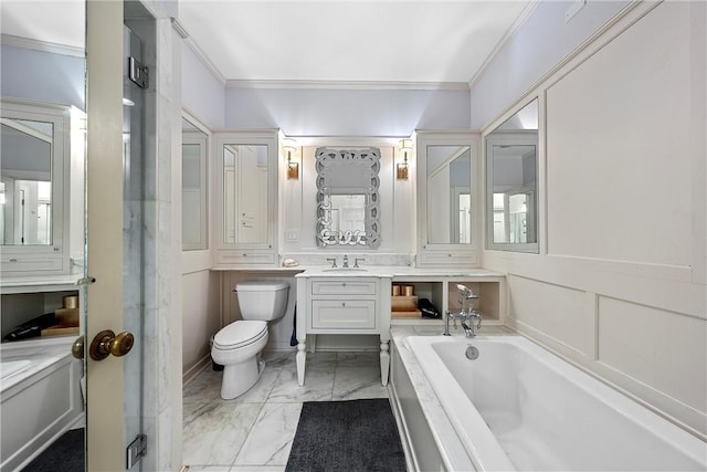 bathroom featuring a washtub, vanity, toilet, and crown molding