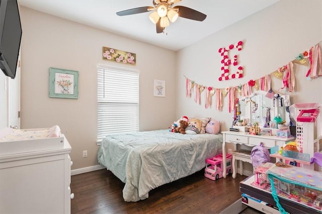 bedroom with ceiling fan and dark wood-type flooring