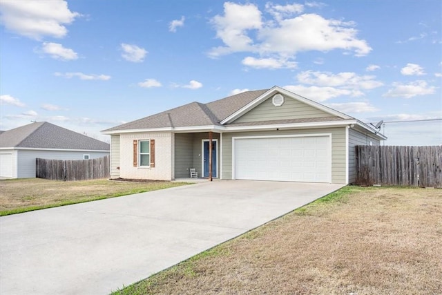 ranch-style house with a garage and a front yard