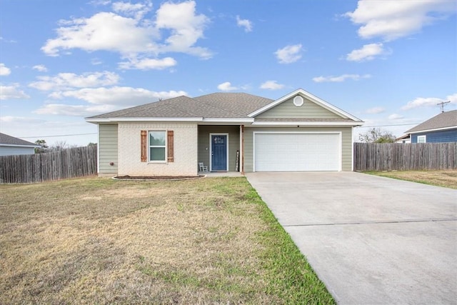 single story home featuring a garage and a front lawn