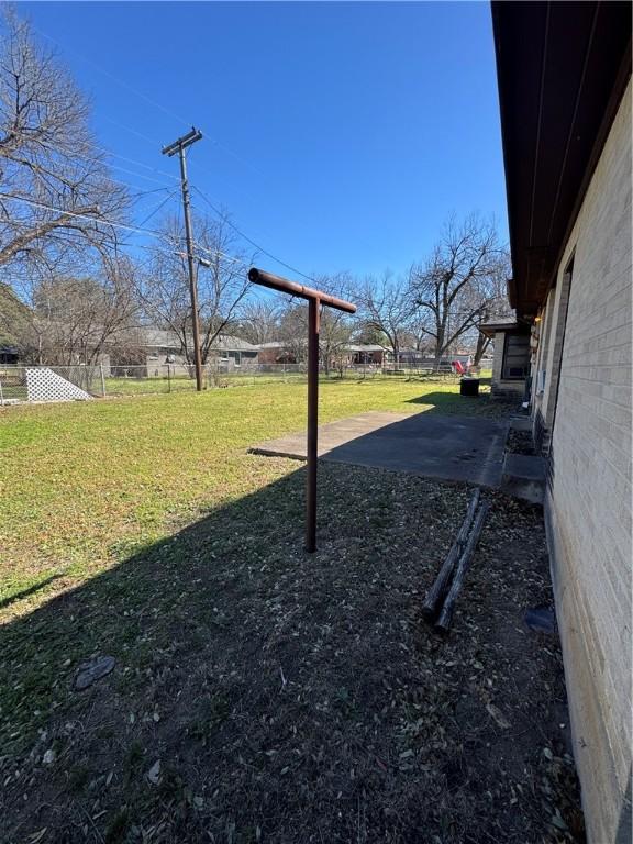 view of yard with a patio area and fence