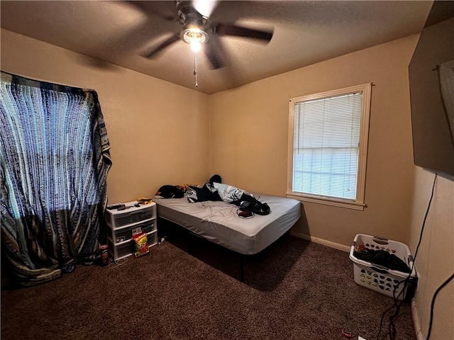 bedroom featuring carpet and ceiling fan