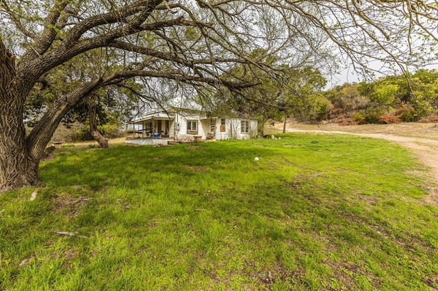 view of yard with a porch