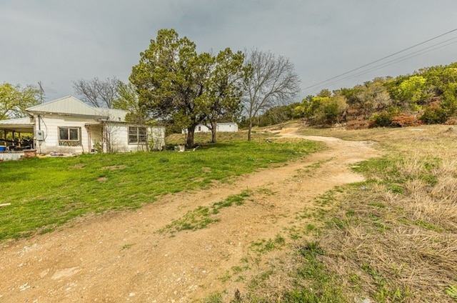 view of yard featuring a carport