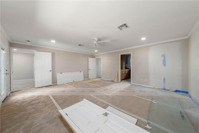 spare room with ceiling fan and ornamental molding