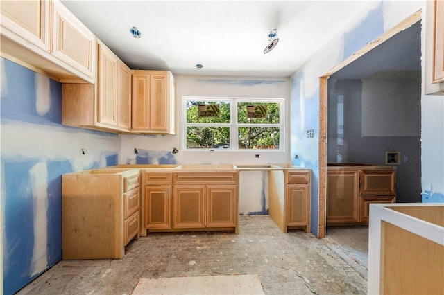 kitchen with light brown cabinetry