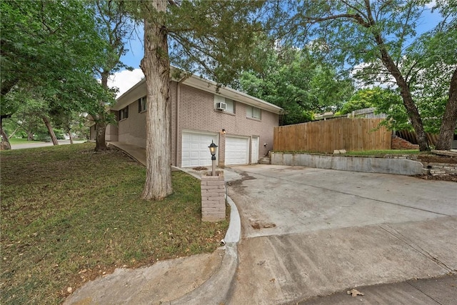 view of side of home featuring a garage