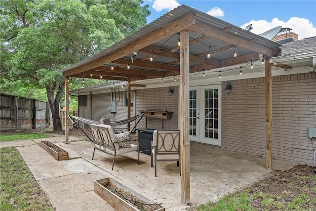 view of patio featuring french doors