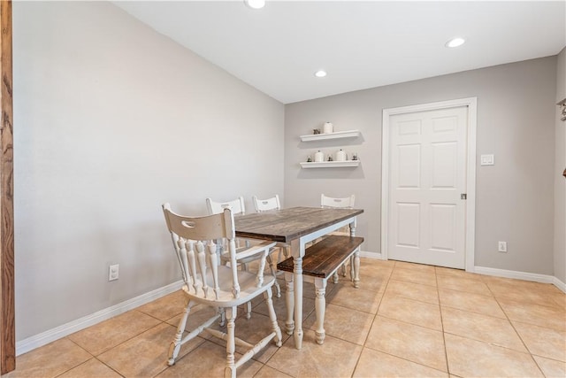 dining room featuring light tile patterned flooring, recessed lighting, and baseboards