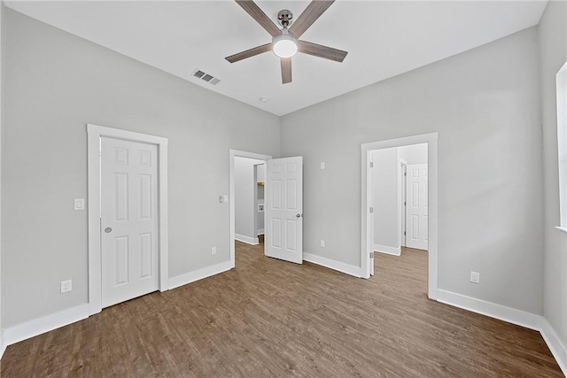 unfurnished bedroom with wood-type flooring and ceiling fan