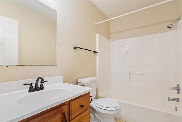 full bathroom featuring shower / tub combination, vanity, and toilet