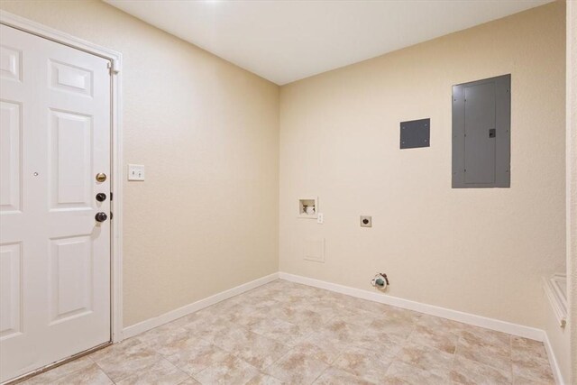 clothes washing area featuring electric panel, washer hookup, and hookup for an electric dryer