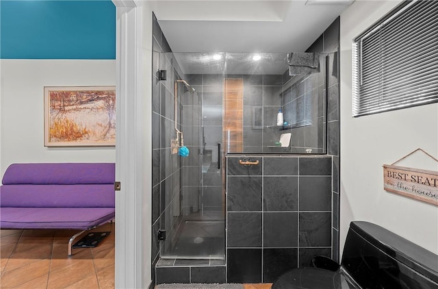 bathroom featuring tile patterned flooring and walk in shower